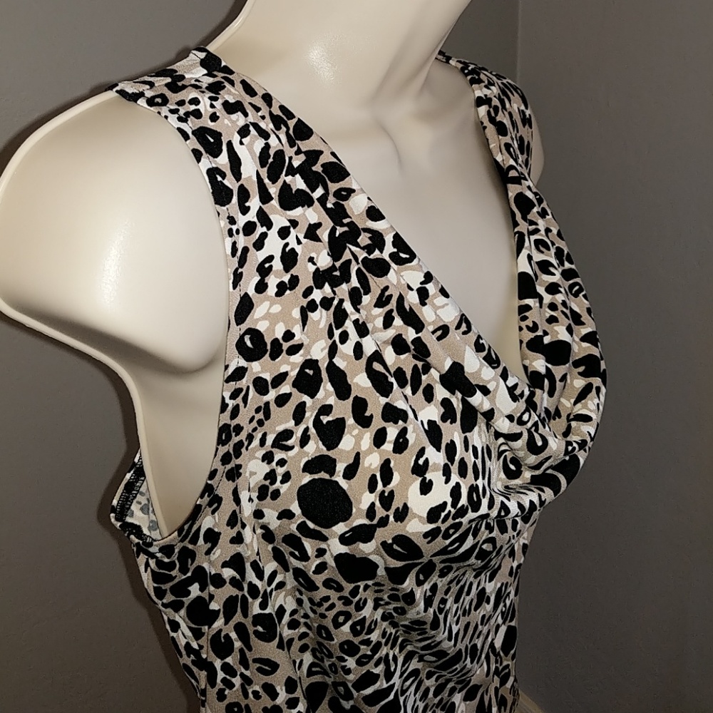 Calvin Klein animal print drape neck top.
